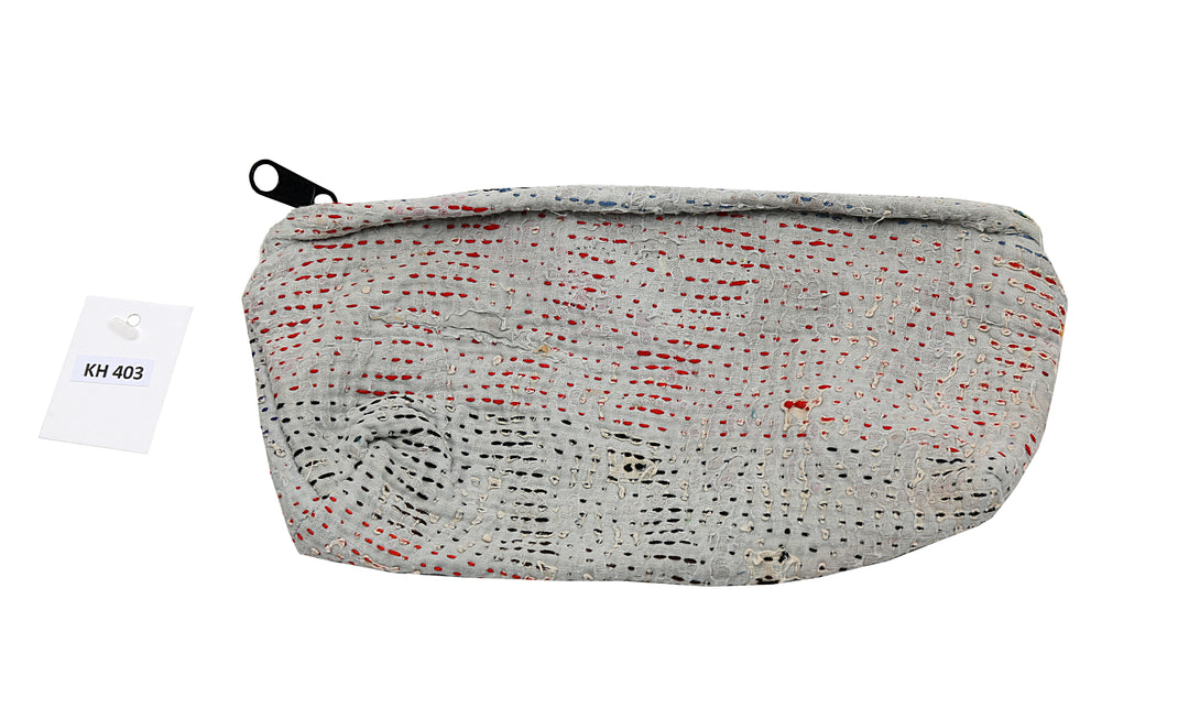 Neceser pequeño – Gris sutil con detalles en rojo